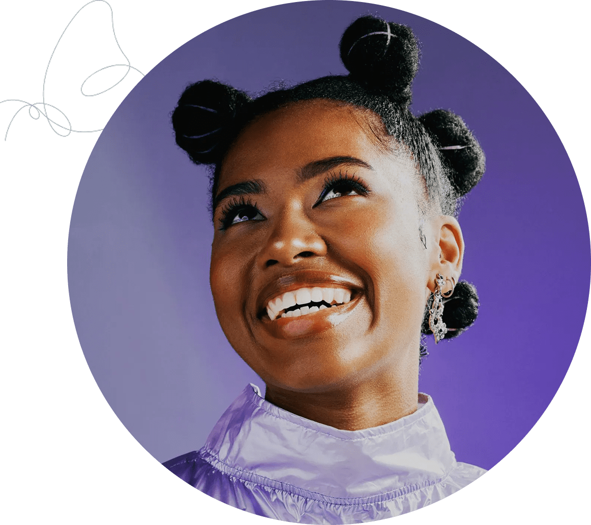 Smiling woman with stylish bun hairstyle